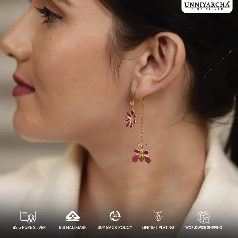 Model wearing handcrafted silver earrings and necklace set with ethnic and festive styling