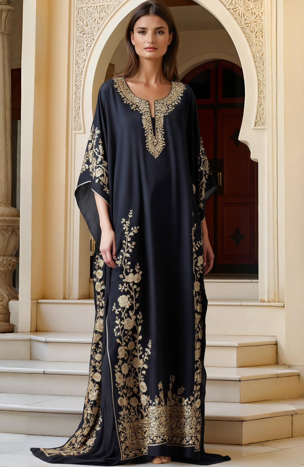 Navy blue floor-length kaftan with gold Kashmiri tilla embroidery on neckline, sleeves, and hem.