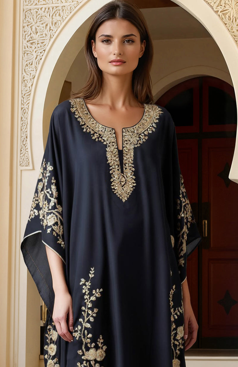 Navy blue floor-length kaftan with gold Kashmiri tilla embroidery and deep V neckline.