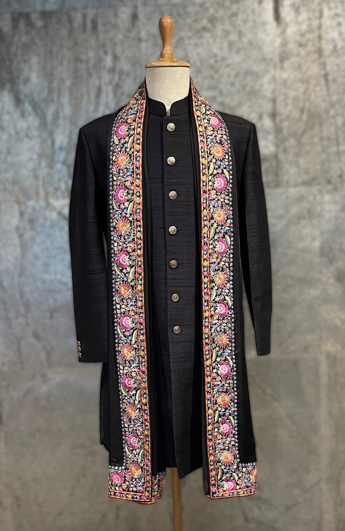 Black satin shawl with multicolor Kashidakari floral embroidery from Kashmir Valley.