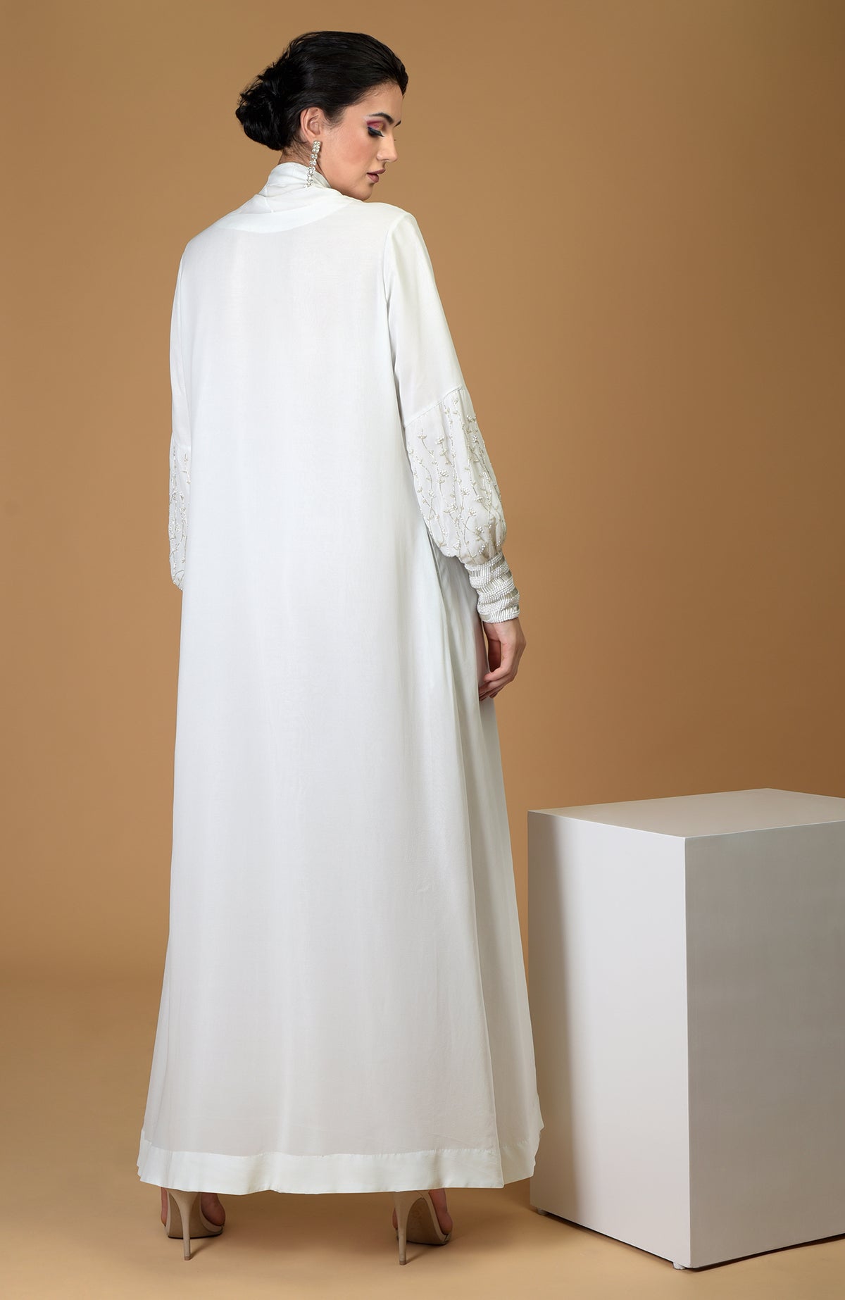 Ash grey silk georgette gown with hand-embroidered sleeves and cuffs.