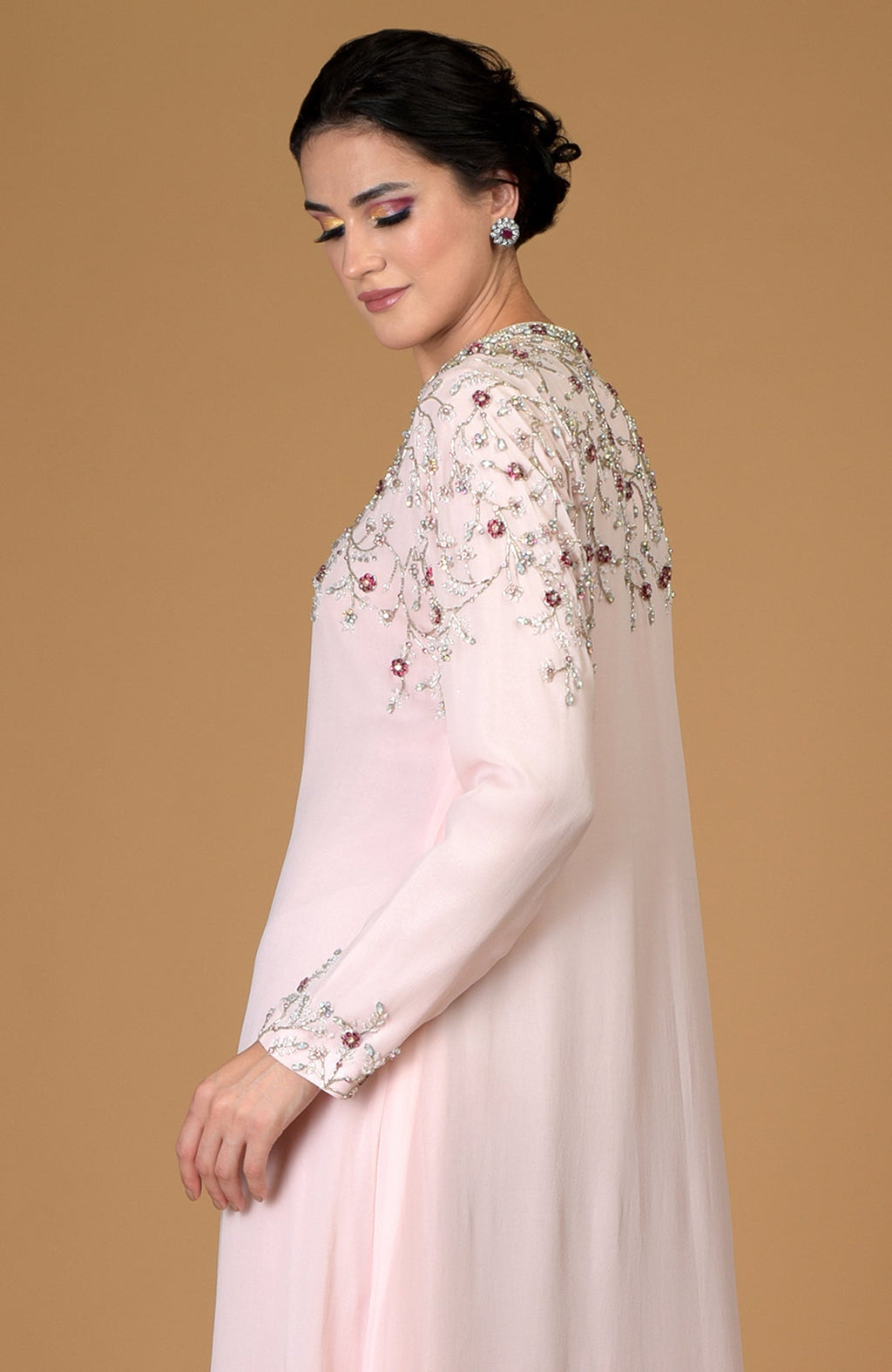 Pale pink silk georgette gown with crystal and bead embroidery.
