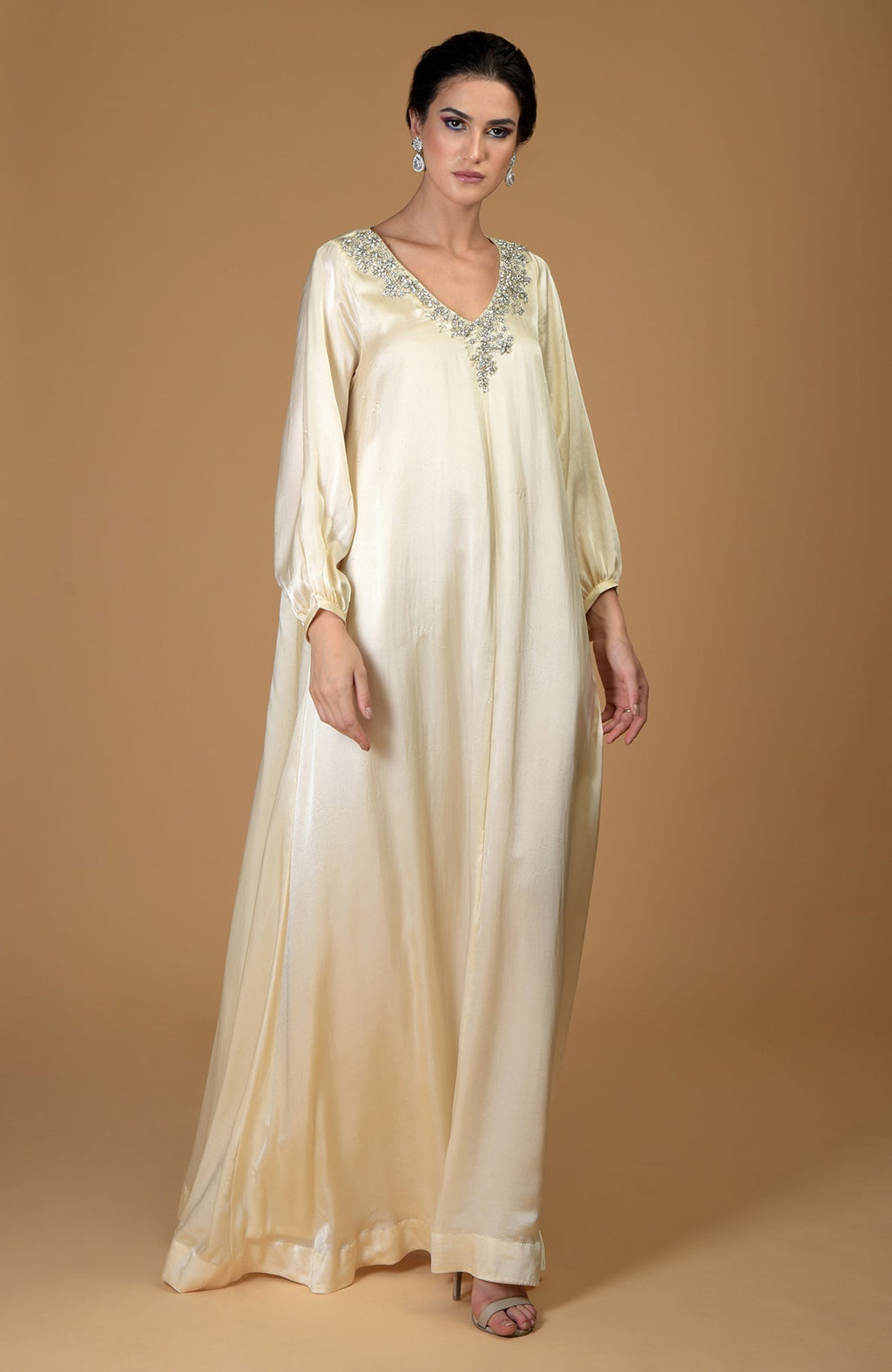 White gold crystal cluster hand-embroidered dress with a V-neckline.