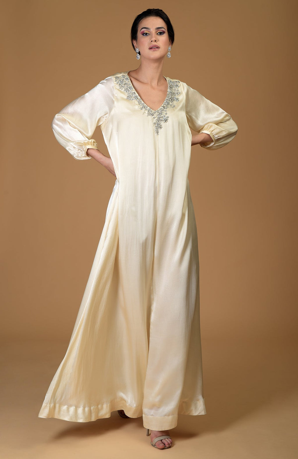 White gold crystal cluster hand-embroidered dress with a V-neck and full sleeves.