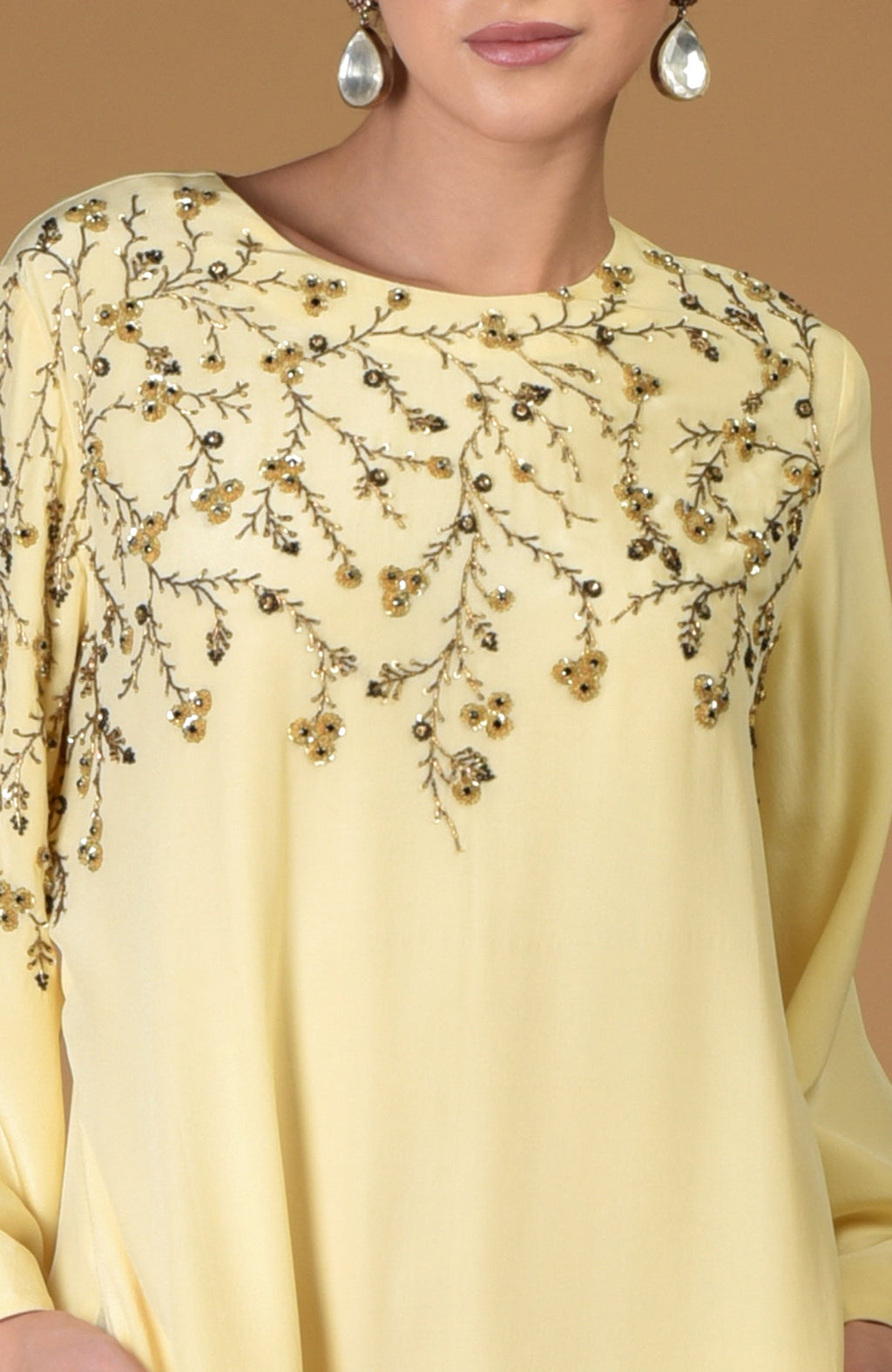 Lemon sprig dress with dainty floral hand embroidery on the yoke and sleeve.