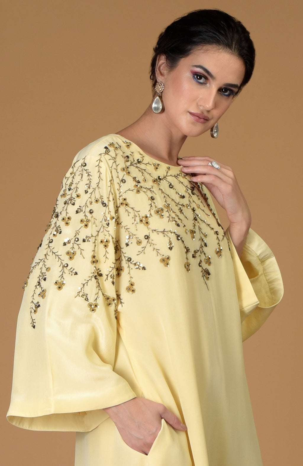 Dainty floral lemon sprig hand embroidered dress with golden sequins and black crystals.