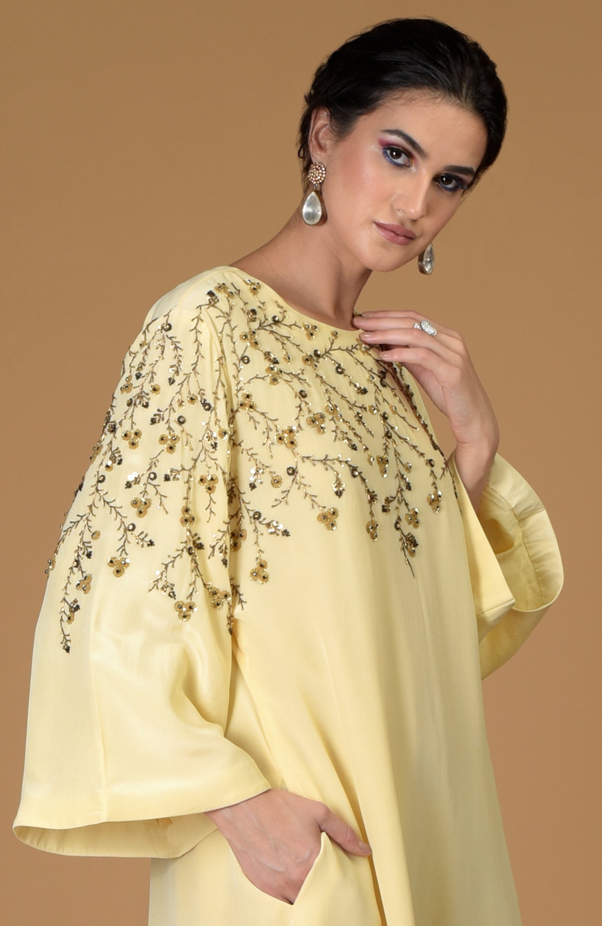 Dainty floral lemon sprig hand embroidered dress with golden sequins and black crystals.