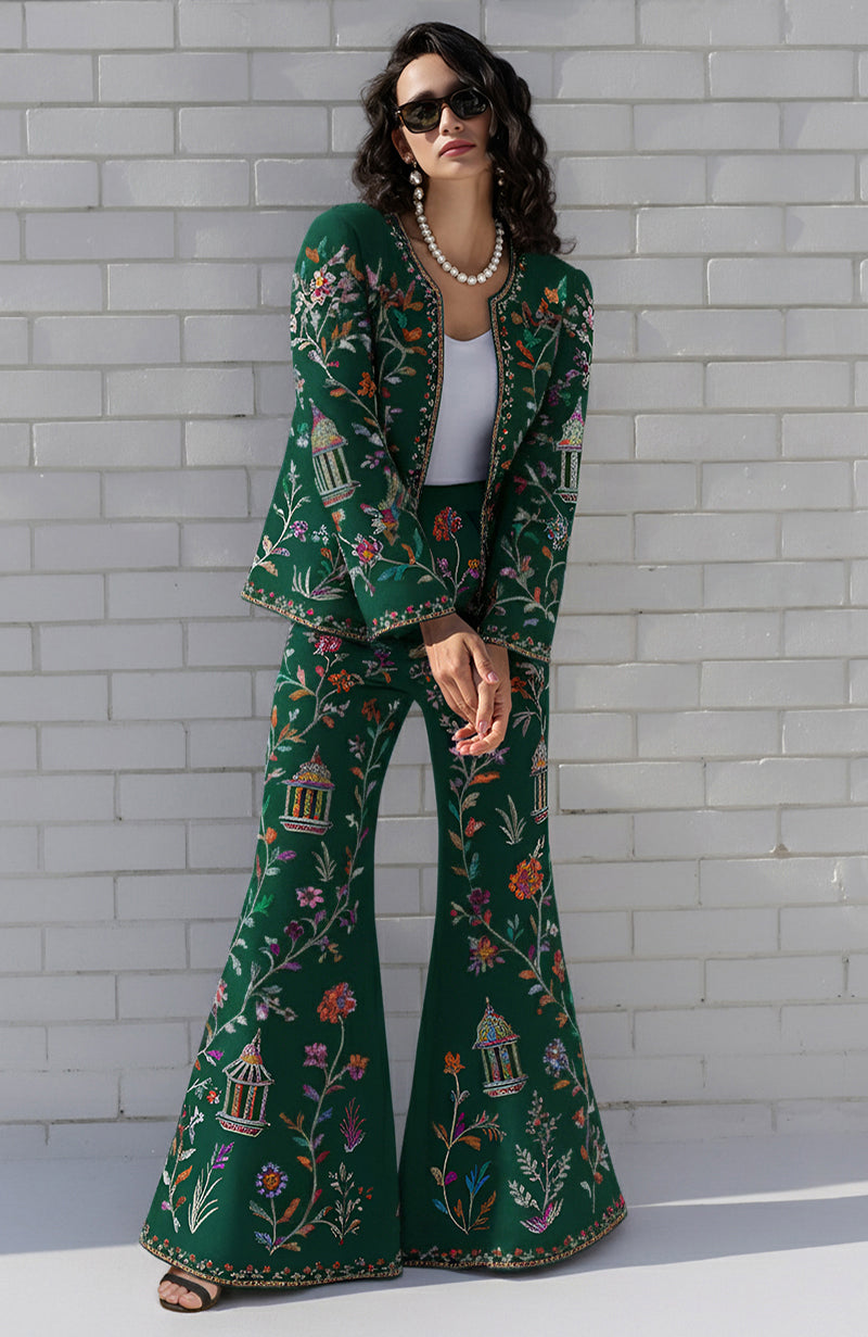 Navy pant suit with flared trousers and long-line jacket featuring colorful Parsi Gara embroidery.