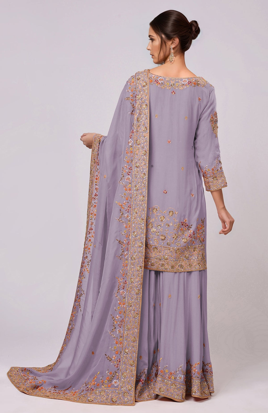 A woman models an Elder Berry Marori and Resham Hand Embroidered Sharara Set.