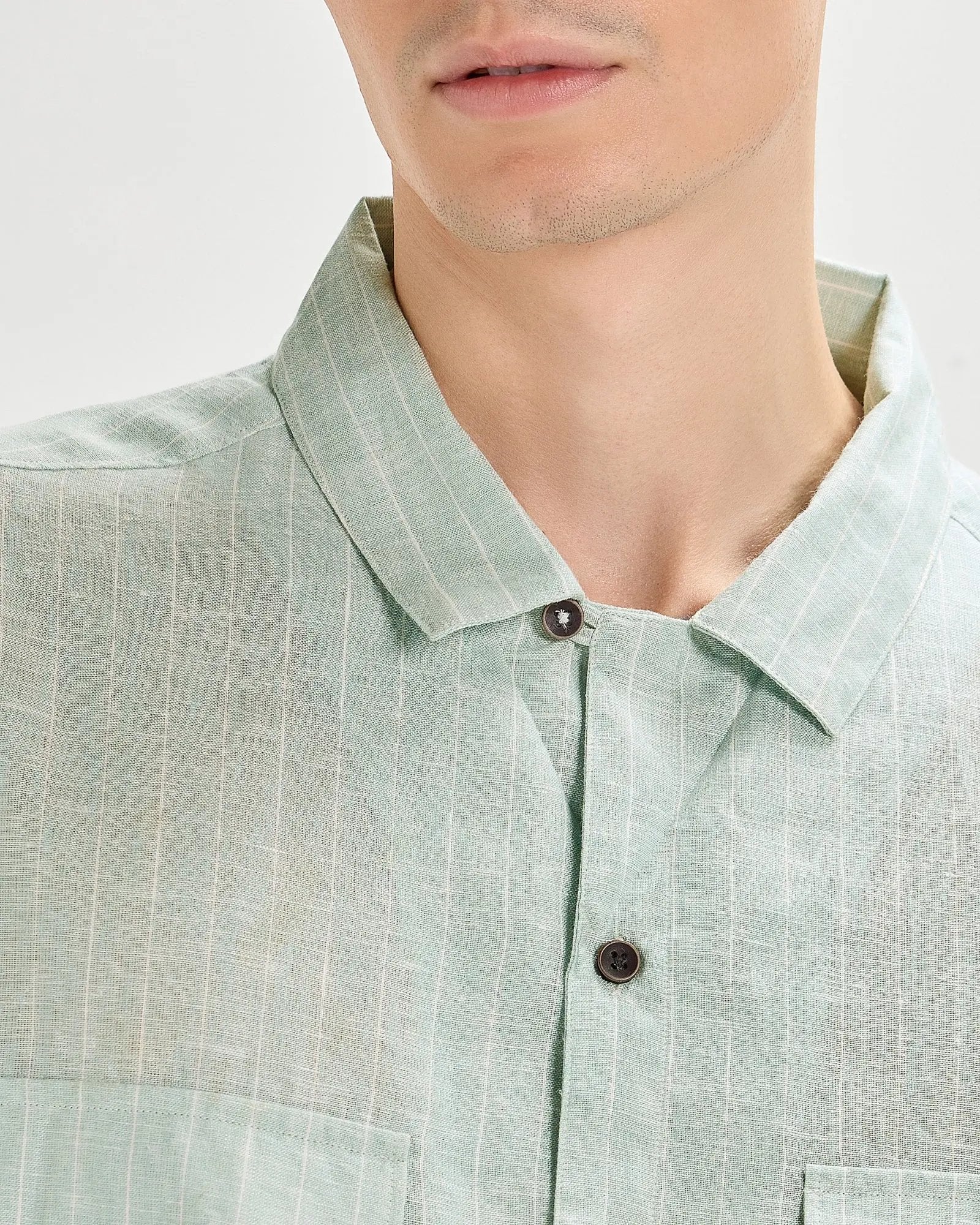 Green oversized striped linen shirtUnited By Hope