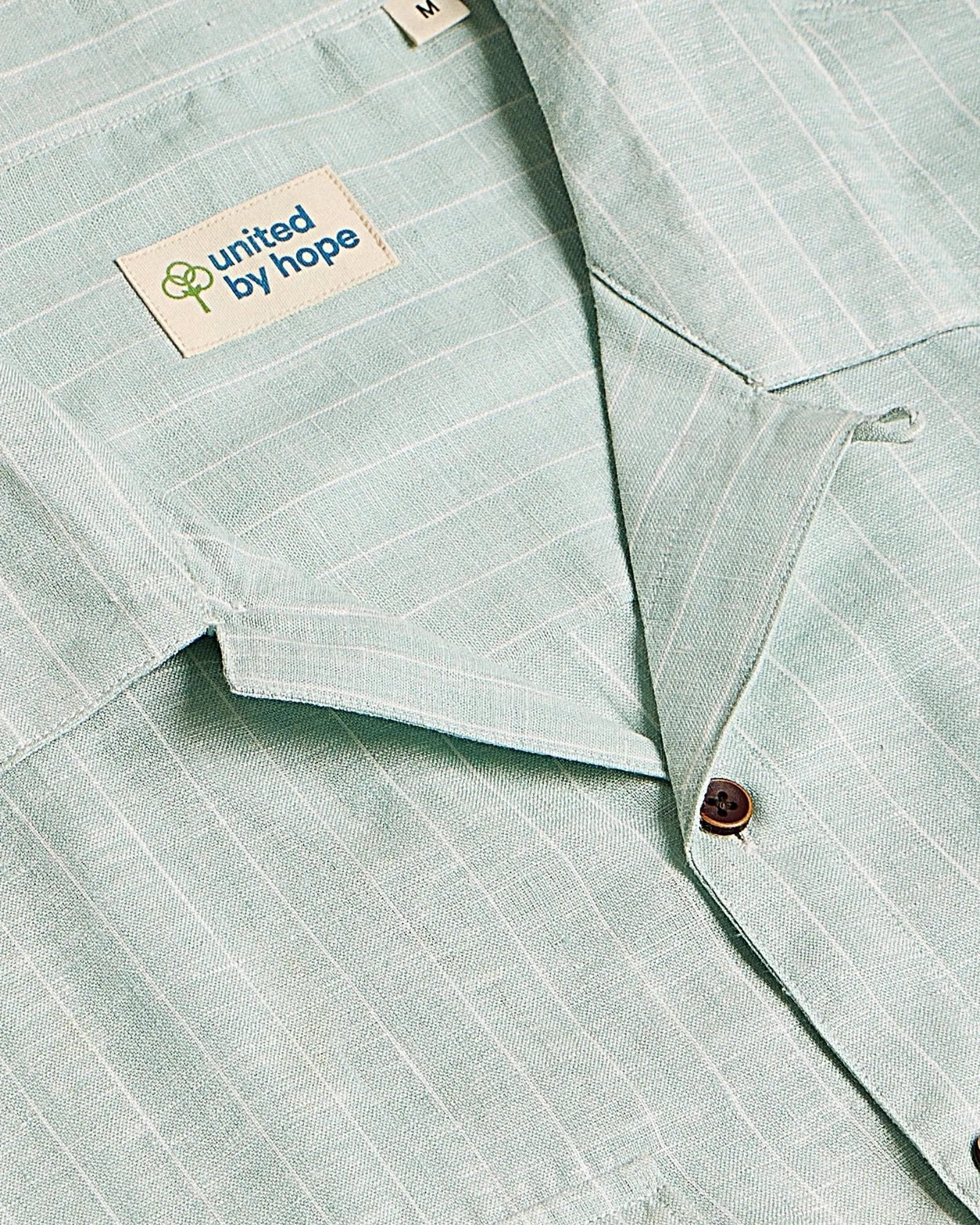 Green oversized striped linen shirtUnited By Hope