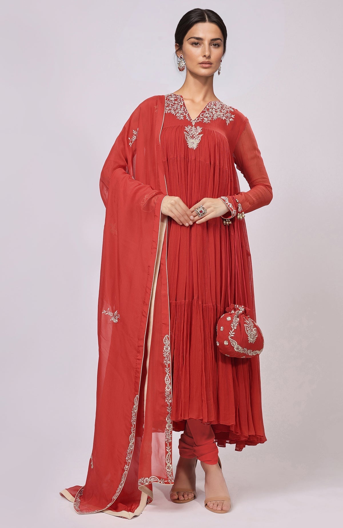 Red Anarkali set with Kashmiri Tilla Aari embroidery and matching churidar and dupatta.