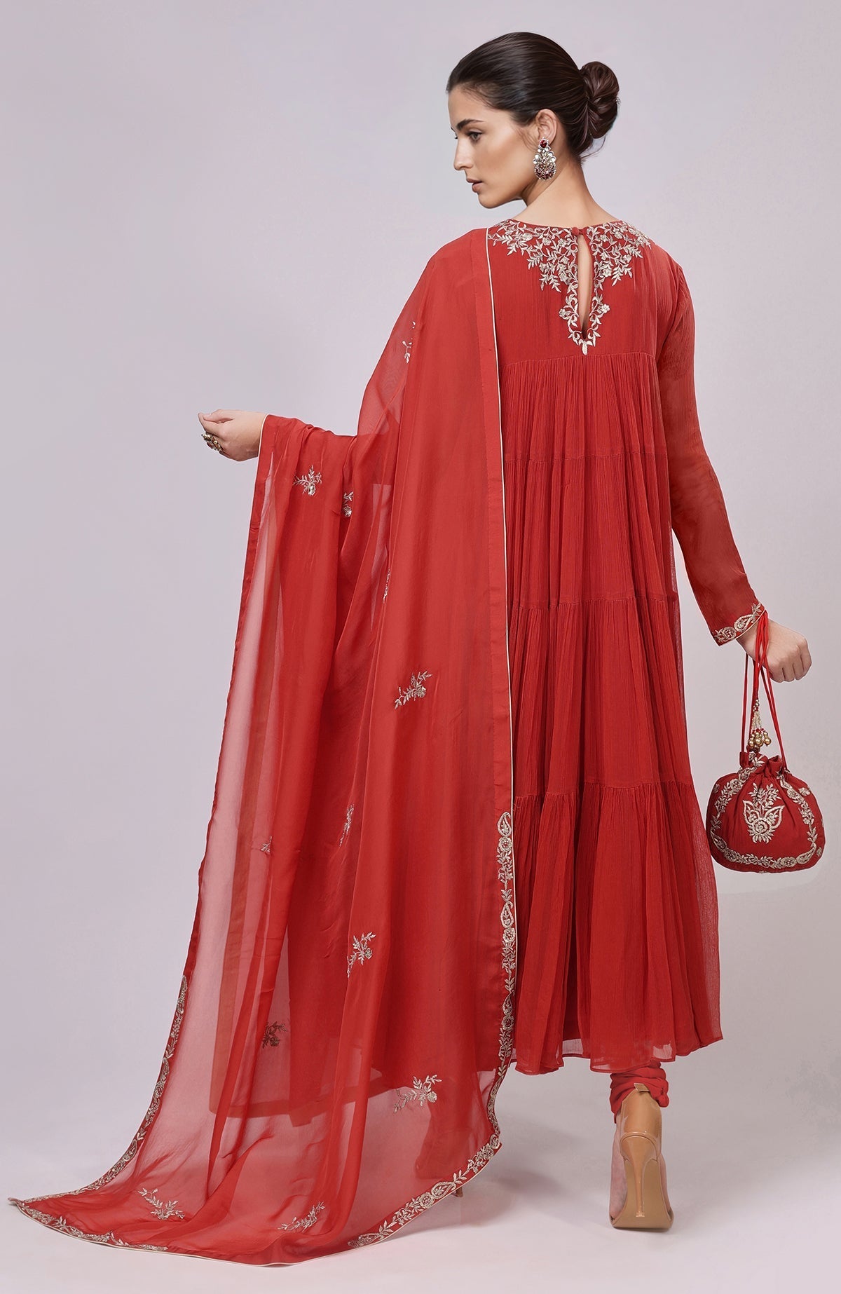 Red Anarkali set with Kashmiri Tilla Aari embroidery and matching churidar and dupatta.