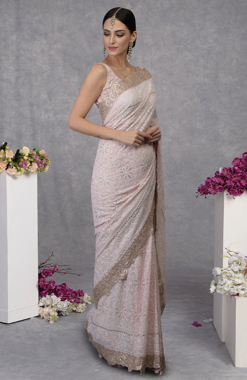 Nude pink georgette saree with hand-embroidered Chikankari, kamdani, and rose gold gota patti borders