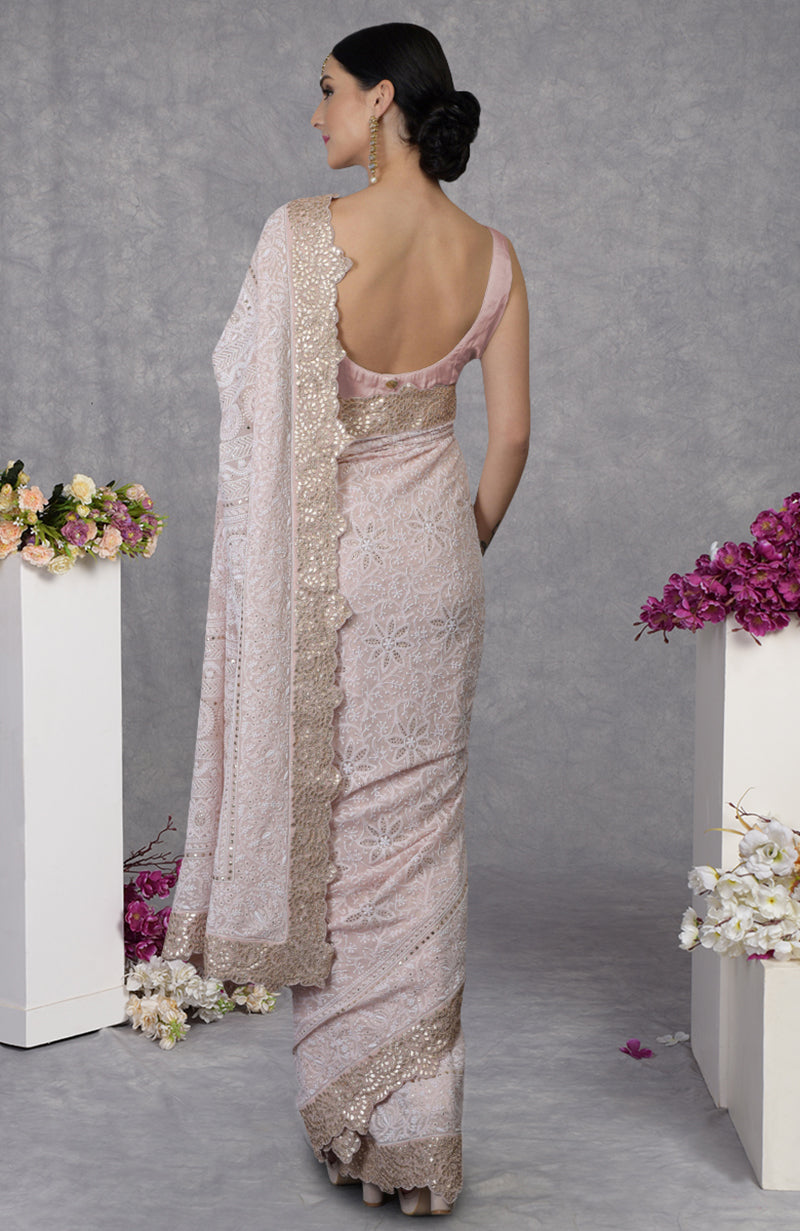 Nude pink georgette saree with hand-embroidered Chikankari and rose gold gota patti borders