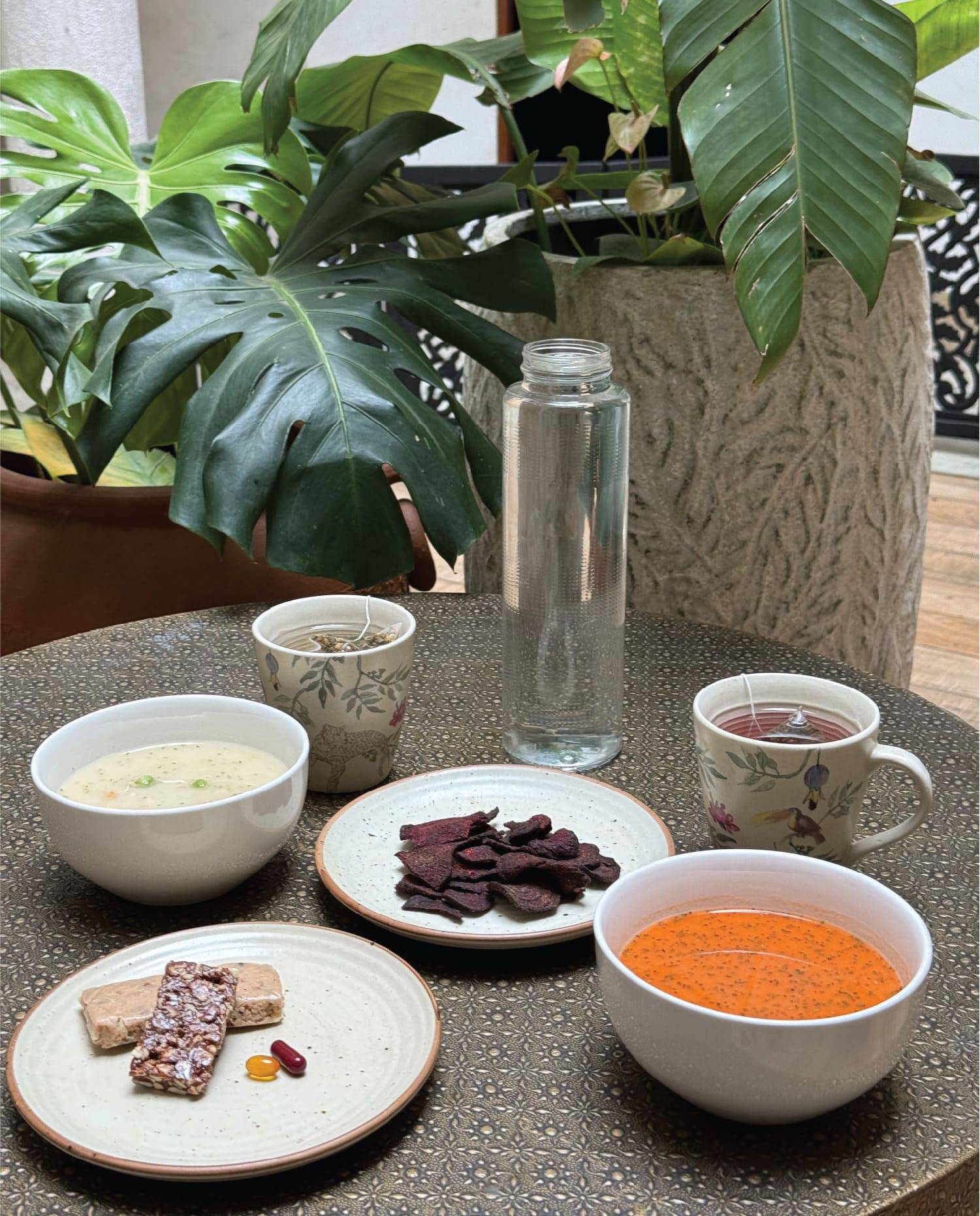 Outlive 1-Day Fasting Program kit featuring plant-based soups, snacks, and supplements