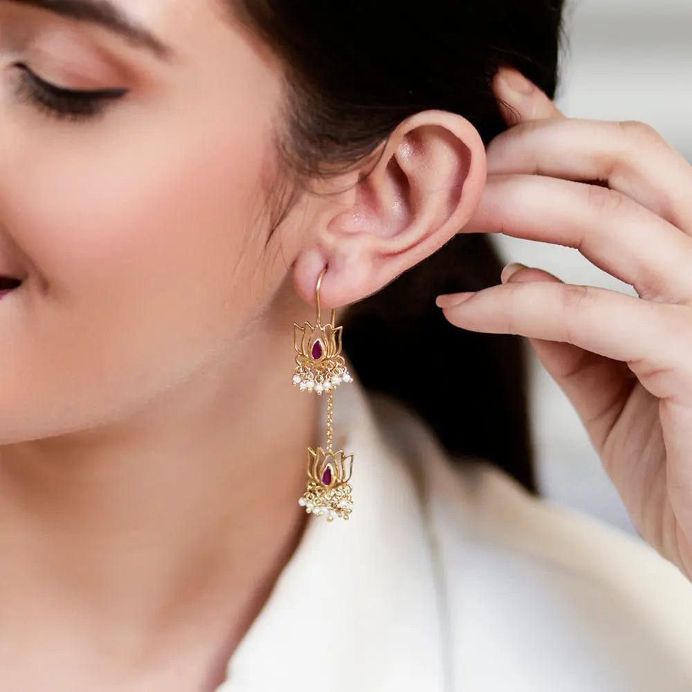 Silver lotus Sui Dhaga earrings from Unniyarcha, featuring delicate chain threading and lotus-shaped drops in 92.5 silver.