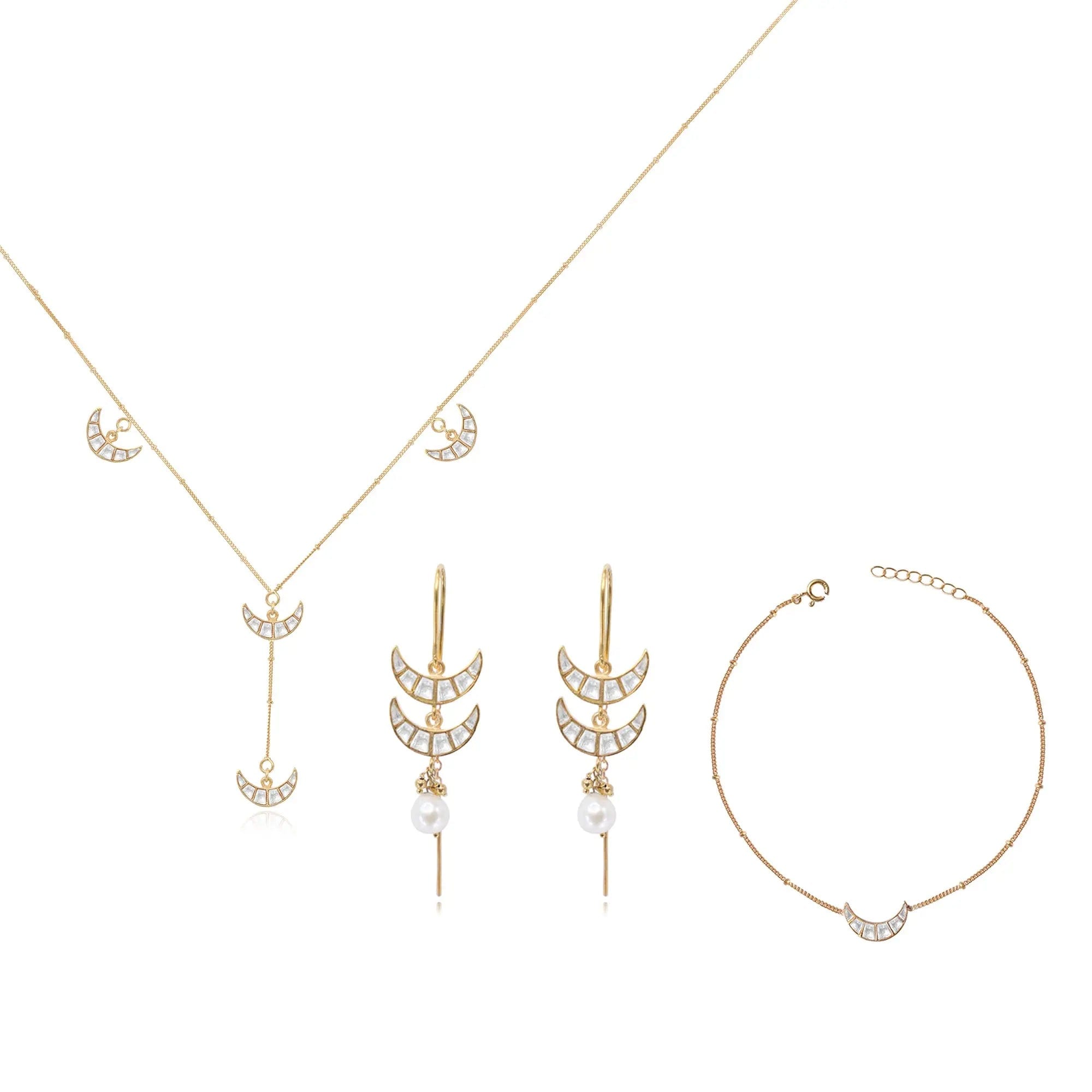 Unniyarcha 92.5 pure silver Chand (moon-shaped) jewelry set, with intricate traditional motifs in earrings and pendant.