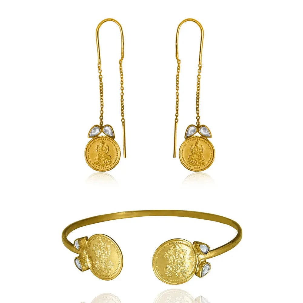 Unniyarcha’s 92.5 sterling silver earring set with detailed circular design and elegant finish, displayed on neutral fabric