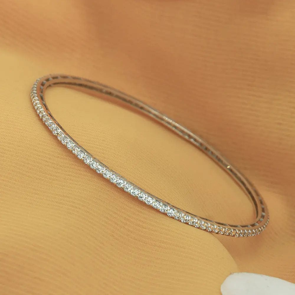 Elegant silver bangle adorned with sparkling zircon stones, handcrafted in 92.5 silver