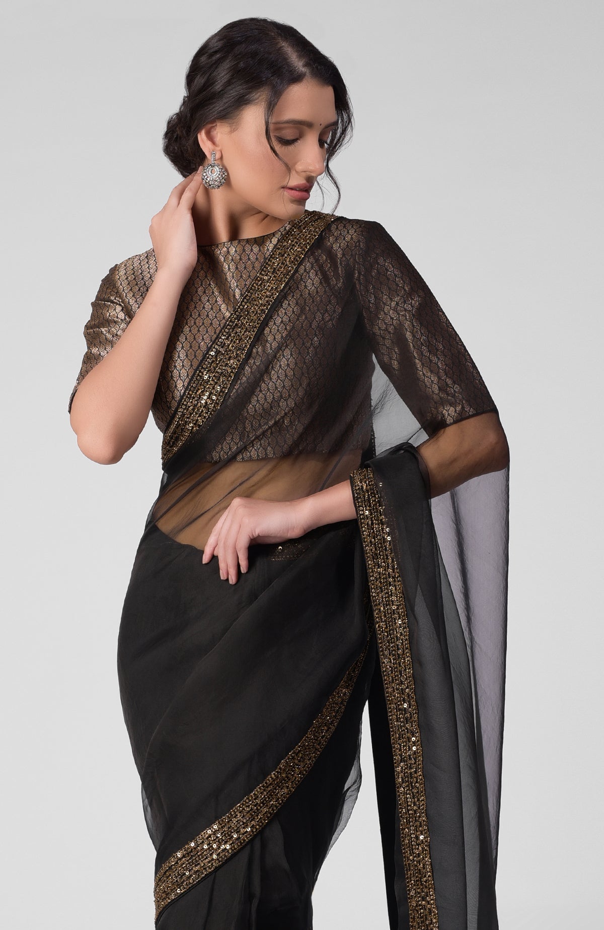 Black silk organza saree with gold zardozi embroidery and silk banarasi brocade blouse