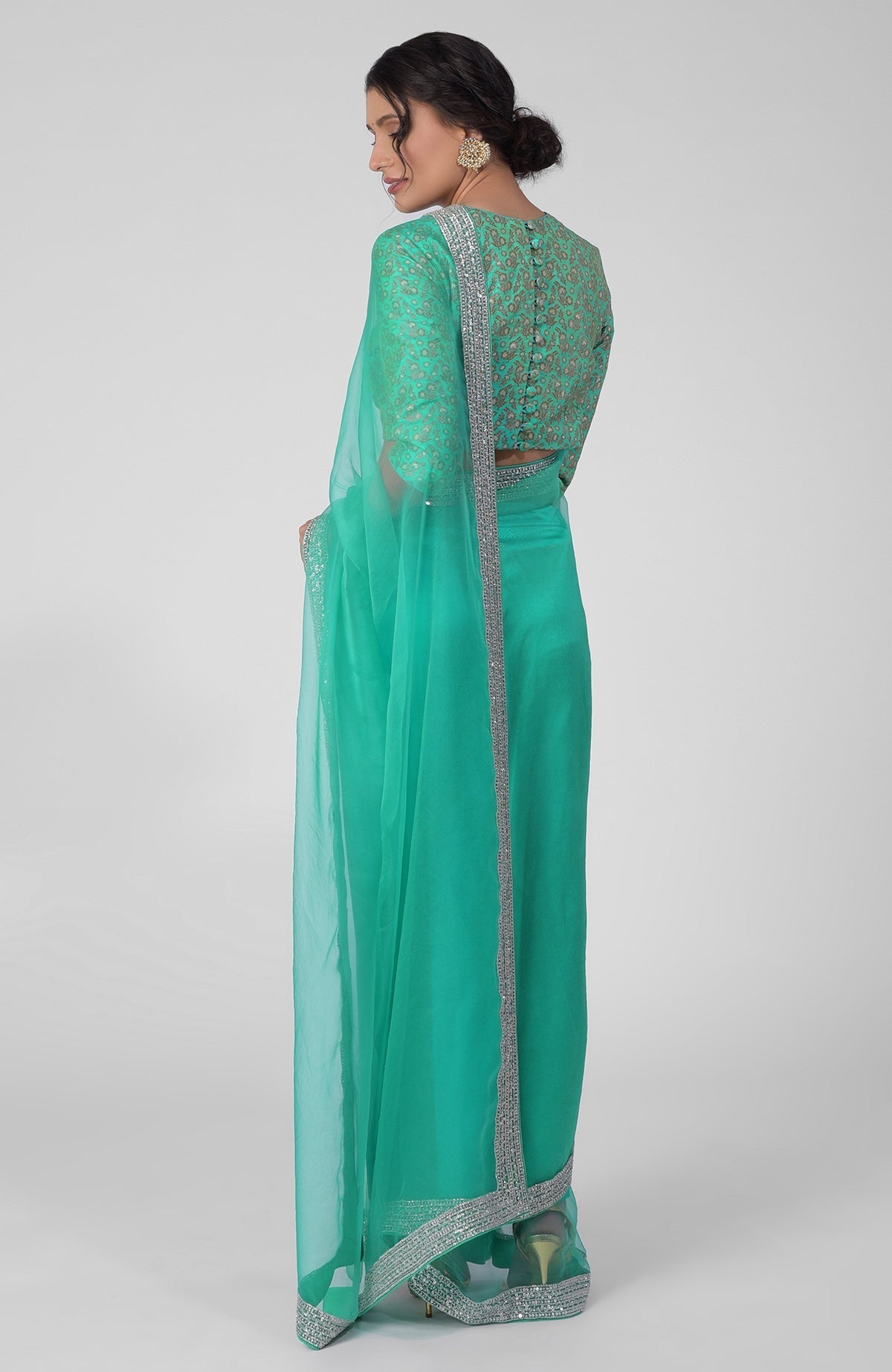 Mint silk organza saree with hand embroidered gold zardozi border and silk brocade blouse
