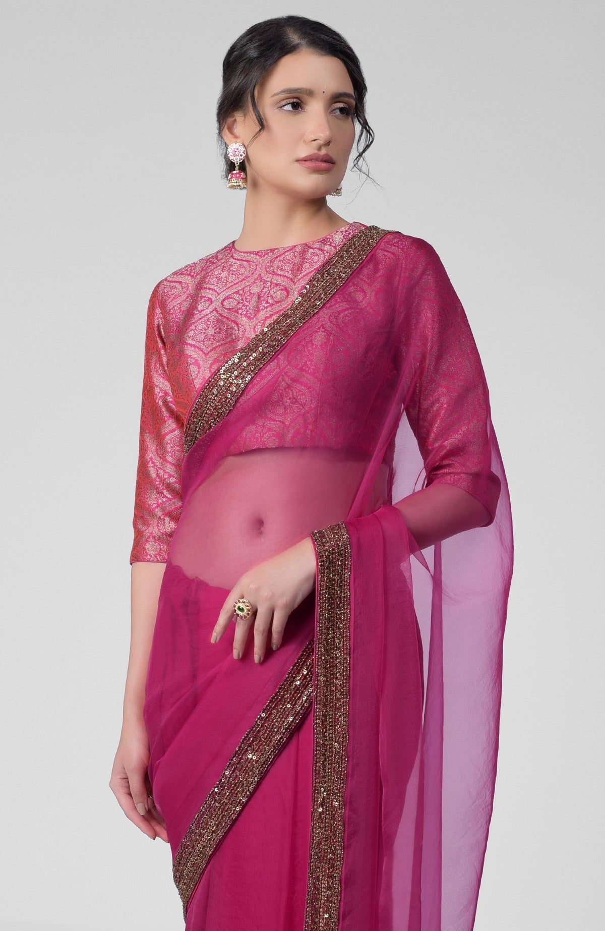 Fuchsia silk organza saree with gold zardozi embroidery and silk banarasi brocade blouse