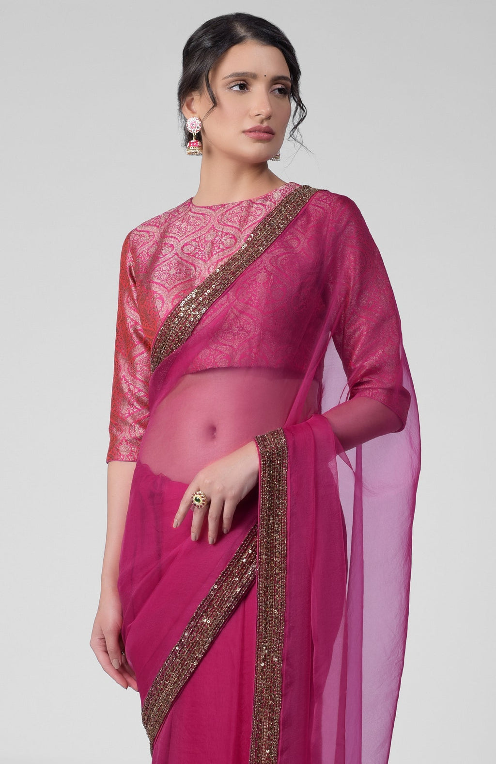 Fuchsia silk organza saree with gold zardozi border and silk banarasi brocade blouse