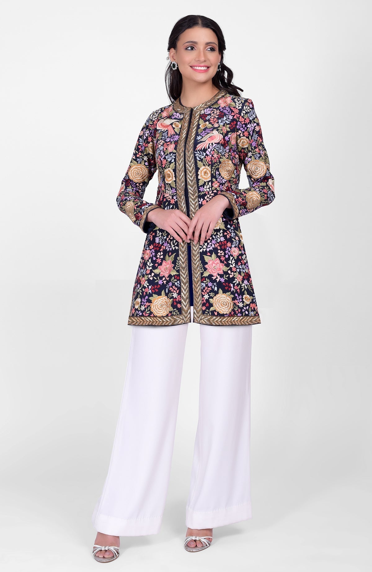 Navy blue Parsi Gara jacket with multicolor silk embroidery and gold zardozi borders paired with ivory pants
