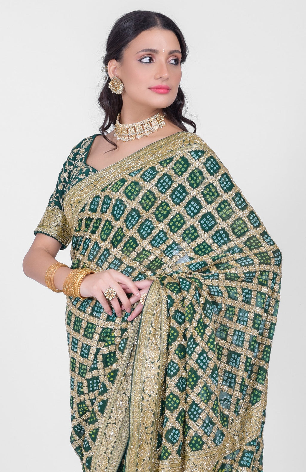 Bottle green Bandhej saree with Banarasi zari and zardozi hand embroidery and matching blouse