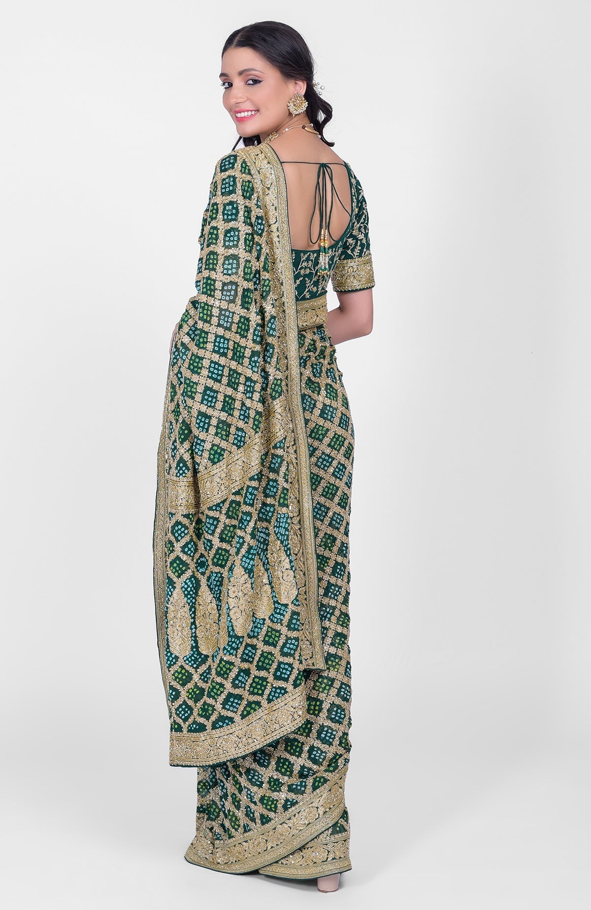 Bottle green Bandhej saree with Banarasi zari and hand embroidered zardozi work and blouse