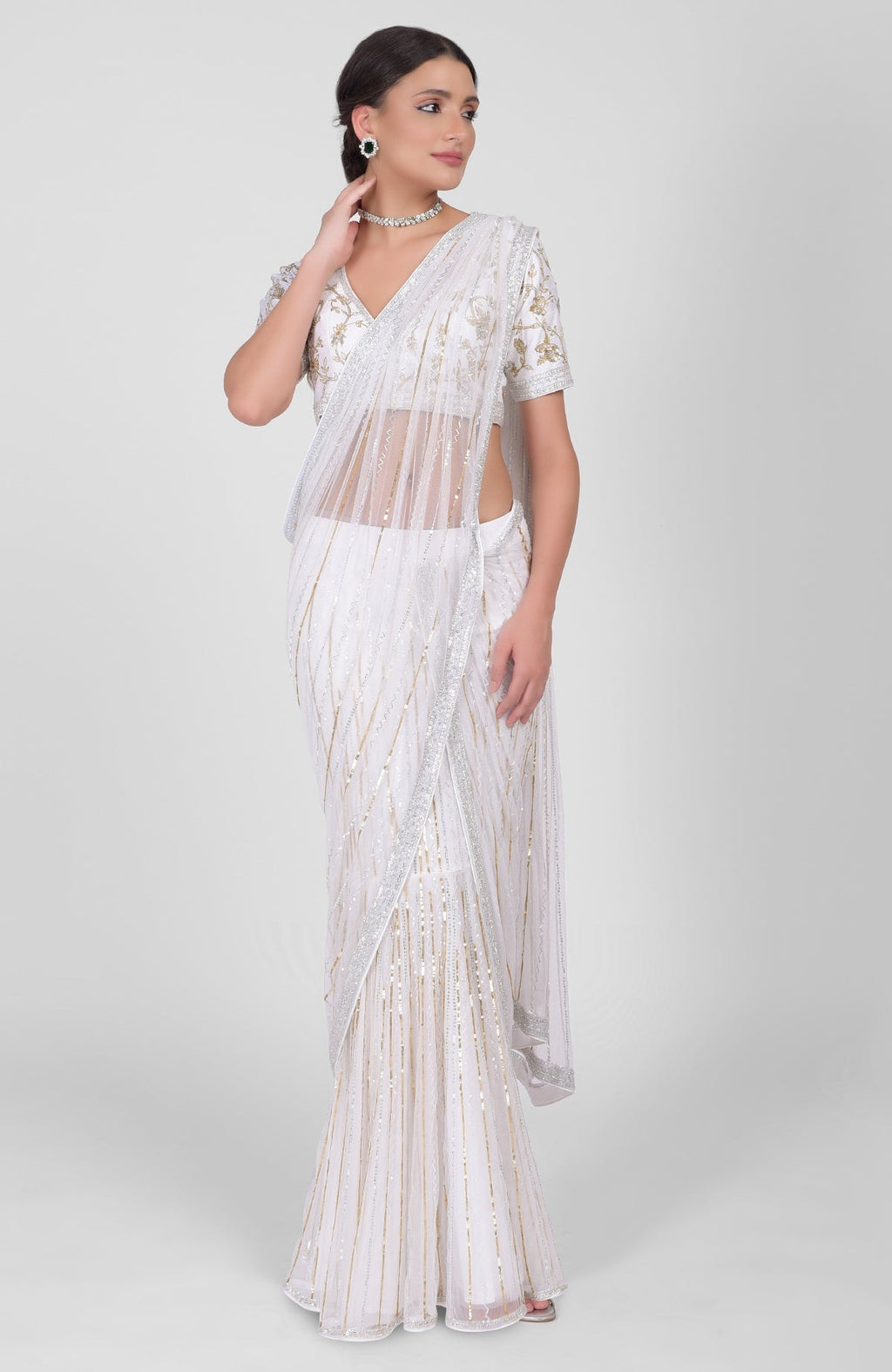 White saree with gold, silver, and white sequin and bead hand embroidery and matching blouse