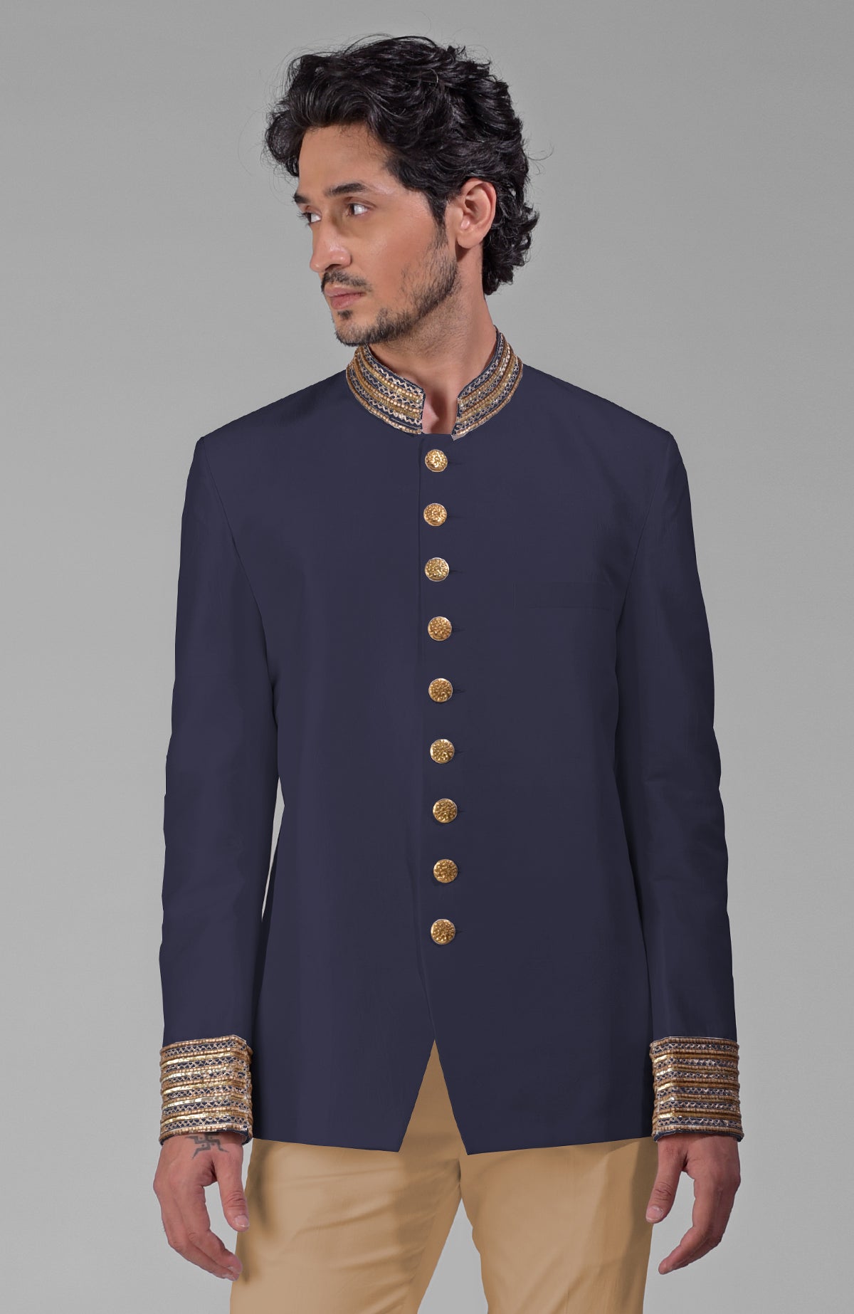 Midnight blue silk bandhgala jacket with zardozi embroidery, beadwork, sequins, and gold buttons