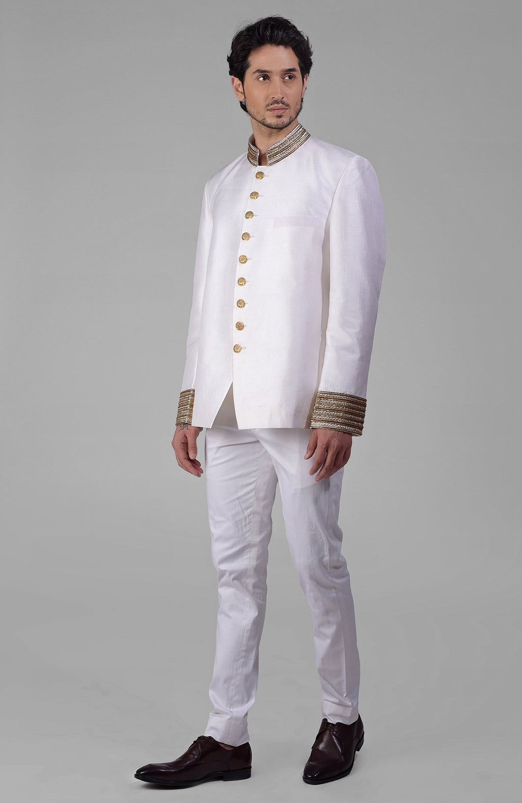 Ivory-gold Zardozi hand-embroidered silk Bandhgala jacket with golden buttons.