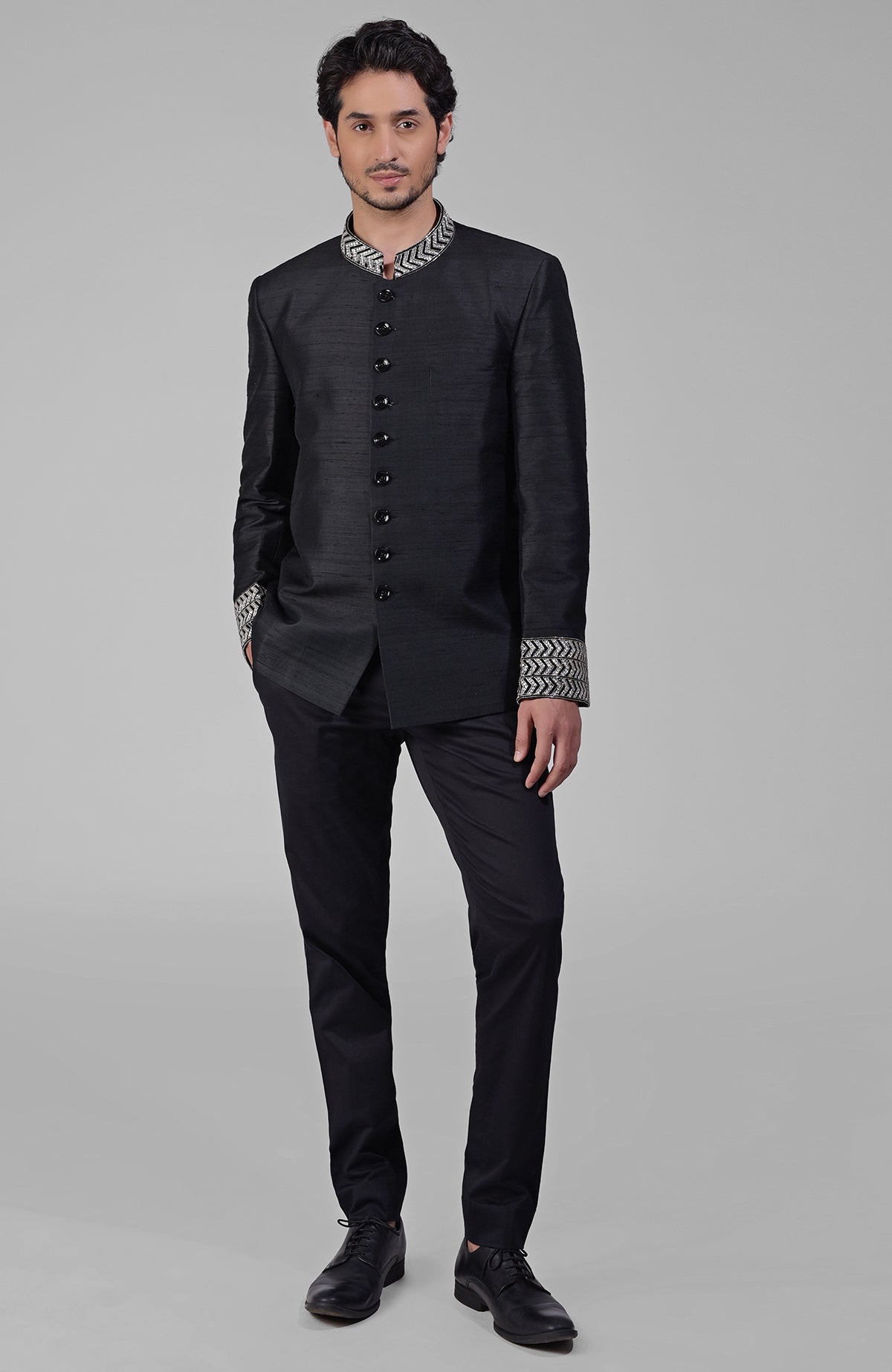 Charcoal grey silk bandhgala jacket with intricate zardozi embroidery and beadwork details