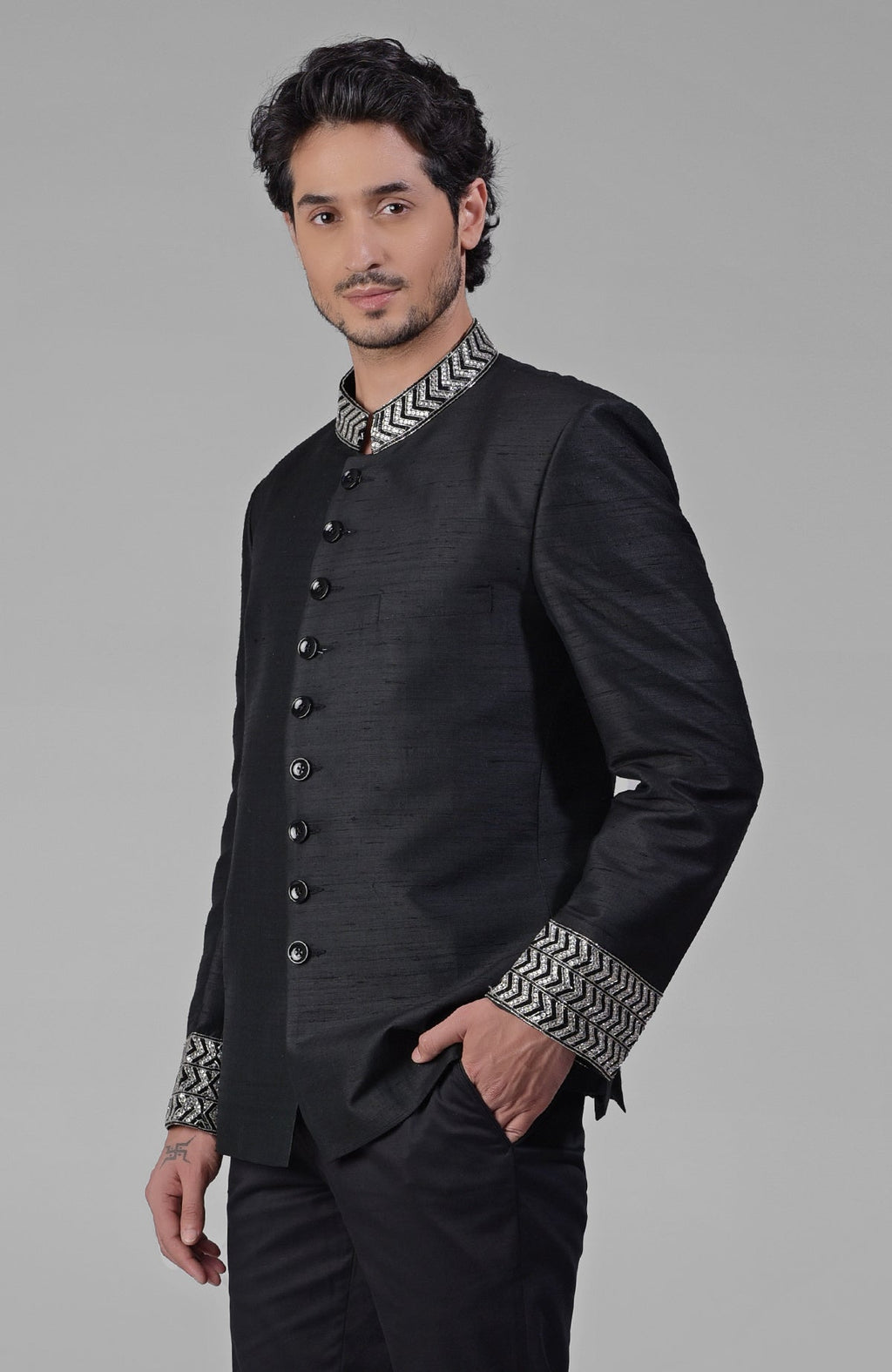 Charcoal grey silk bandhgala jacket with intricate zardozi embroidery and beadwork details