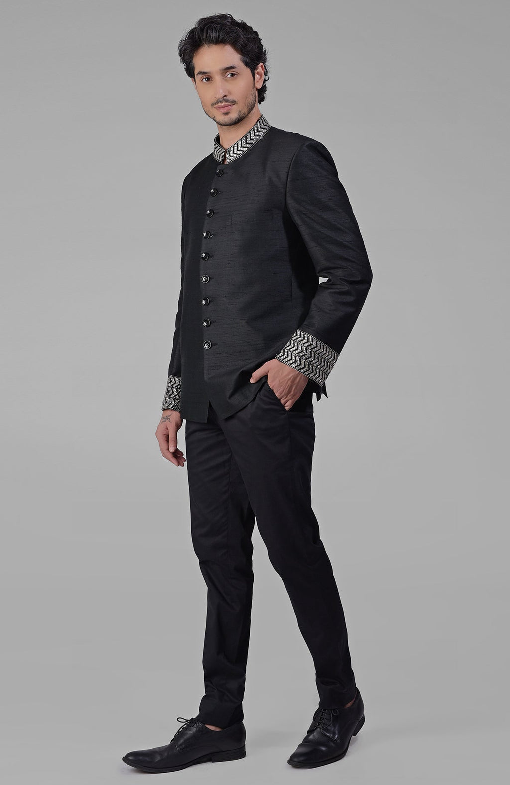 Charcoal grey silk bandhgala jacket with intricate zardozi embroidery and beadwork details