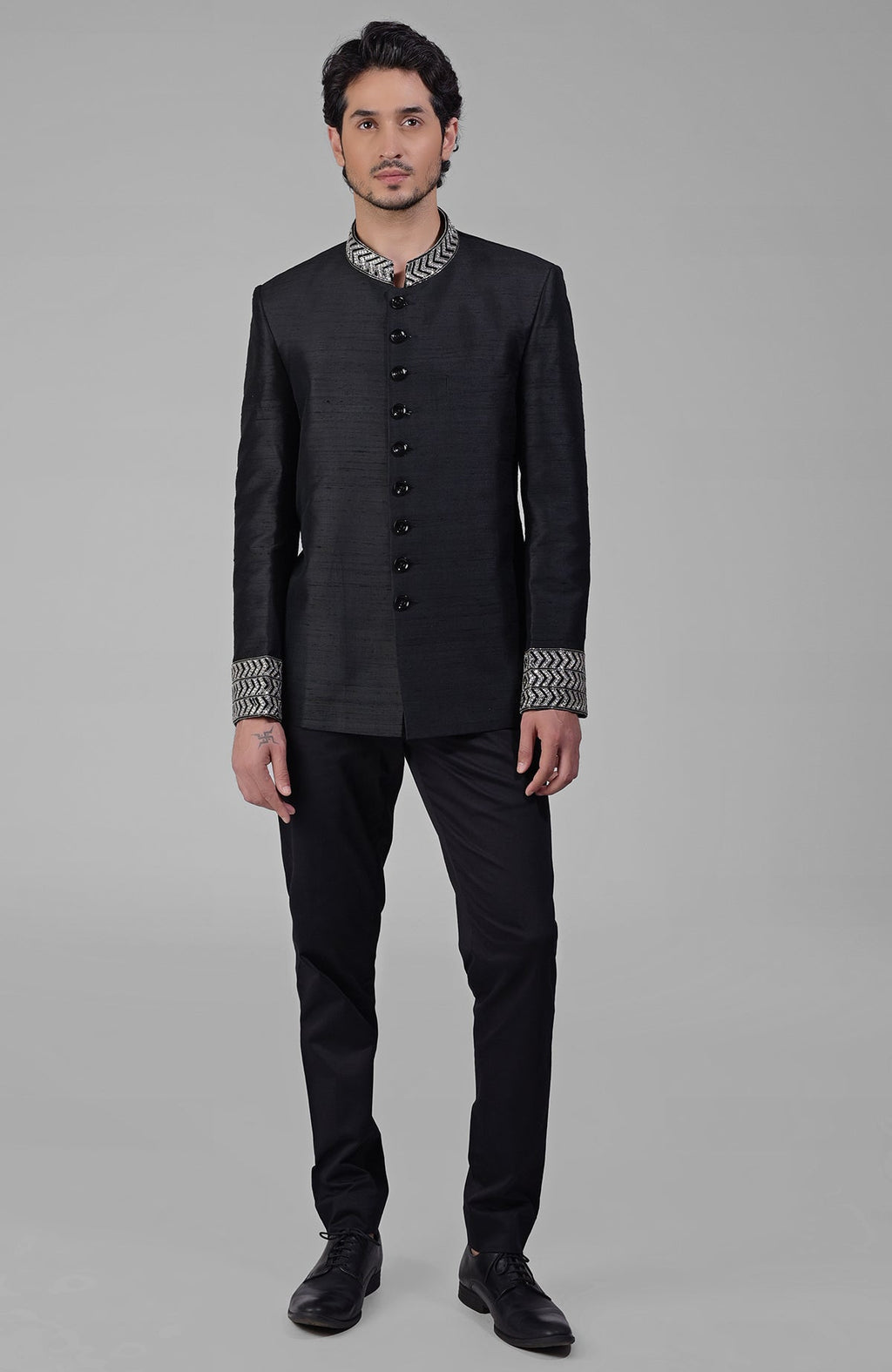 Charcoal grey silk bandhgala jacket with zardozi embroidery and bead embellishments.