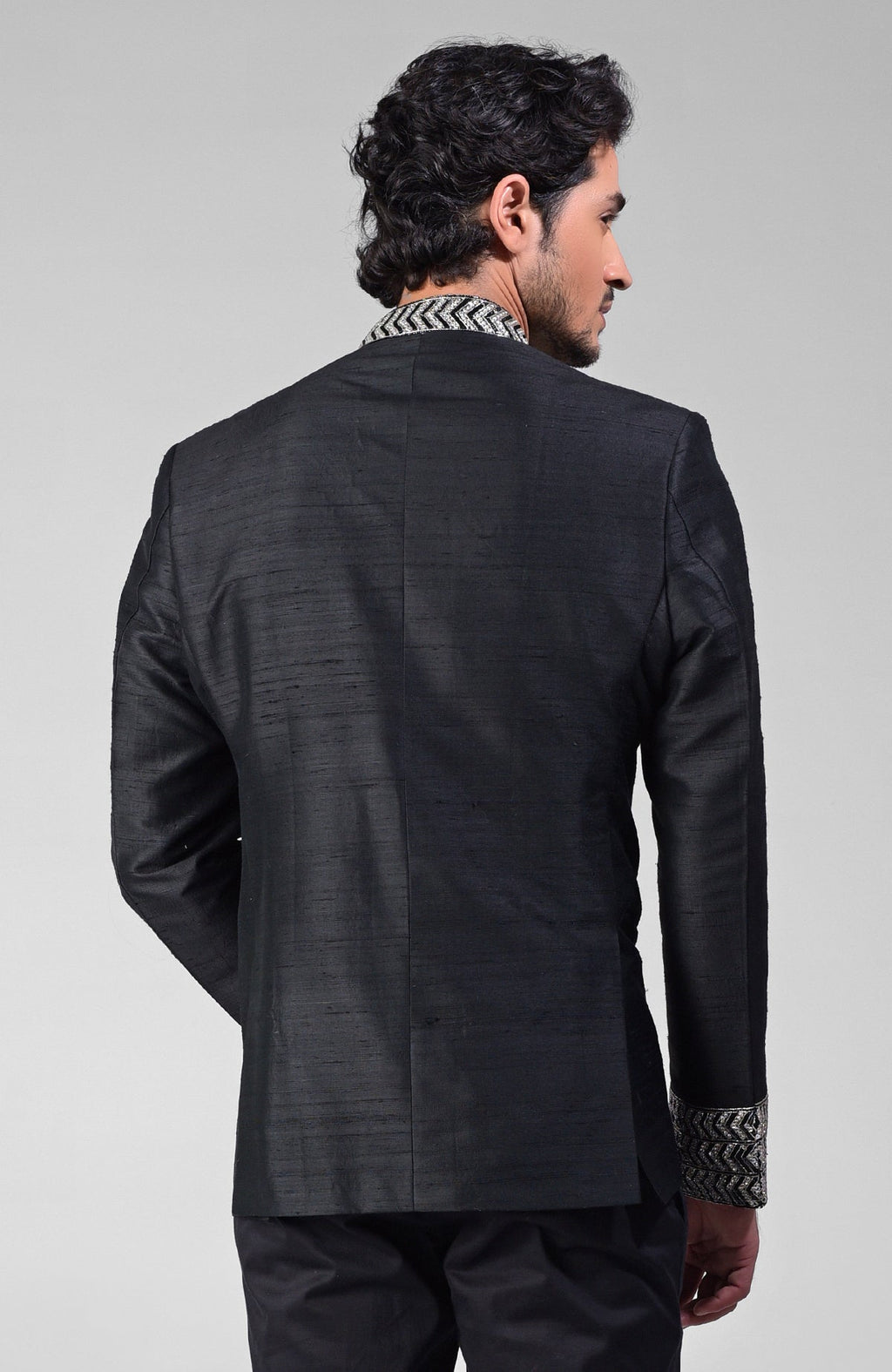 Charcoal grey silk bandhgala jacket with intricate zardozi embroidery and beadwork details