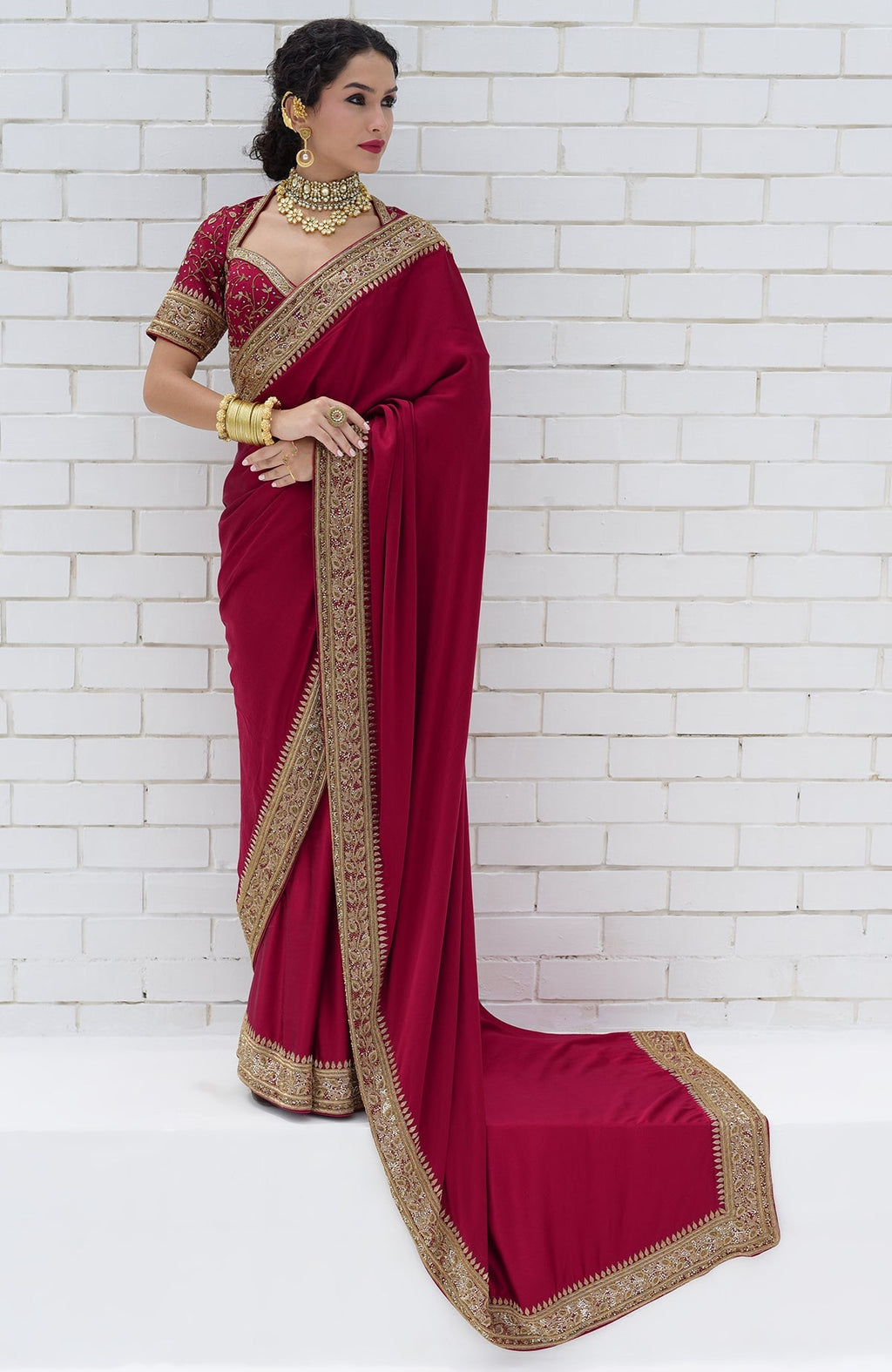 Blood red pure silk saree with gold hand-embroidered zardozi and beadwork borders and blouse