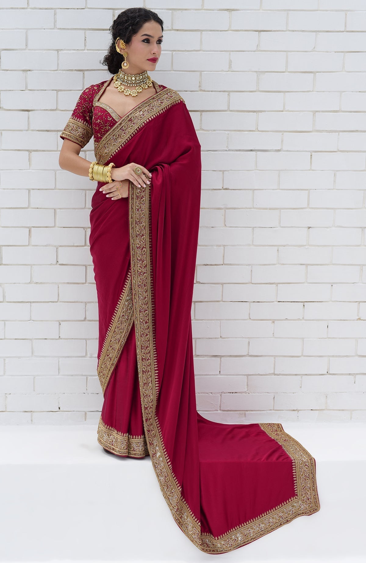 Blood red pure silk saree with gold hand-embroidered zardozi and beadwork borders and blouse