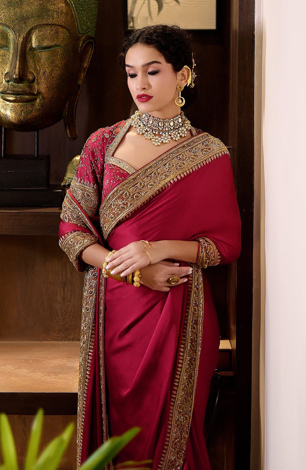 Blood red pure silk saree with gold zardozi hand embroidery and beadwork with matching blouse