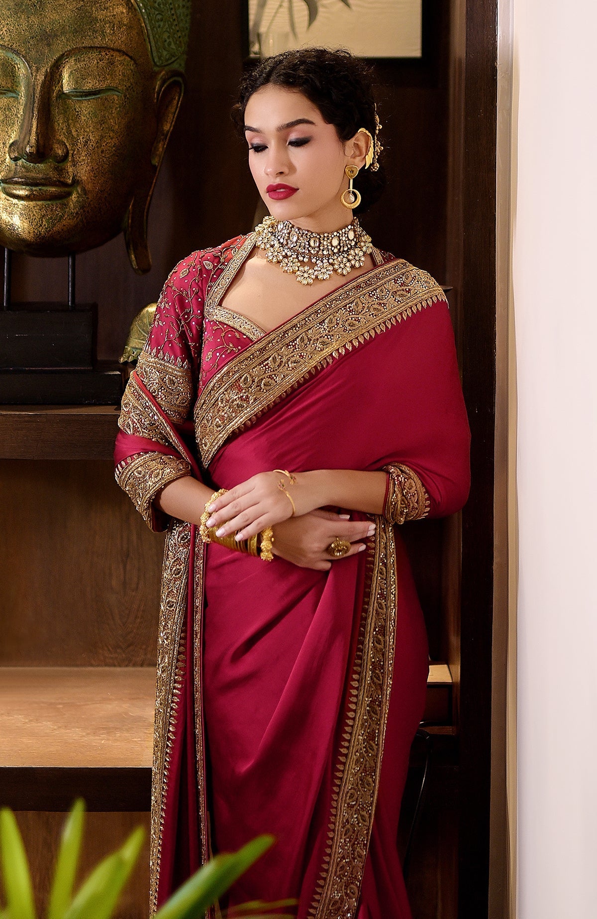 Blood red pure silk saree with gold zardozi hand embroidery and beadwork with matching blouse
