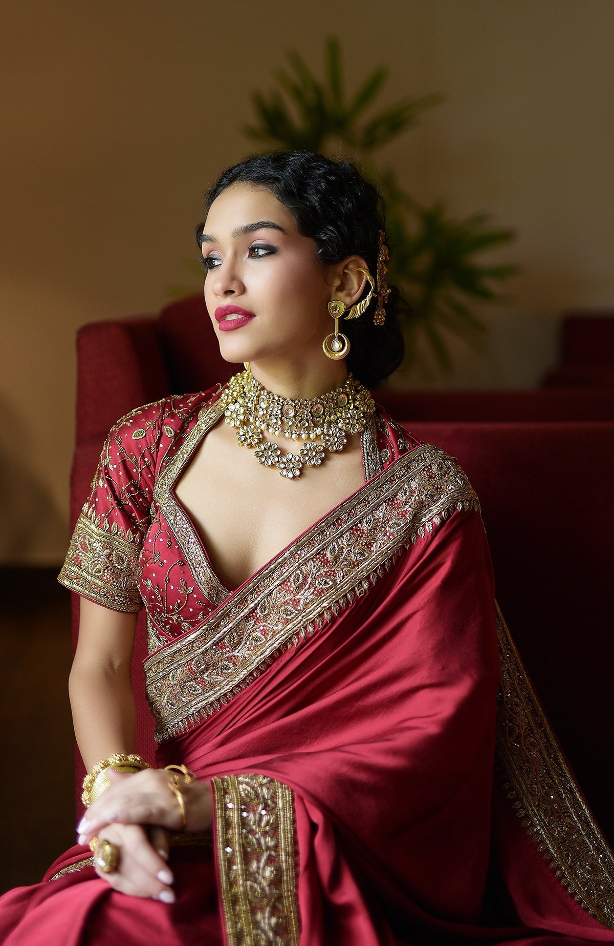 Blood red pure silk saree with gold hand-embroidered zardozi and beadwork borders and blouse