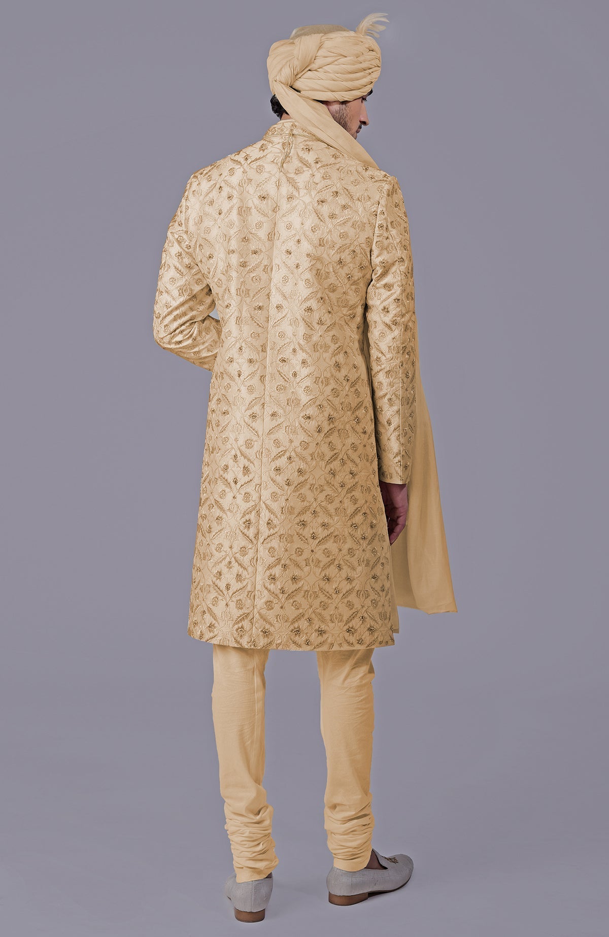 Golden sherwani with floral embroidery and silk organza dupatta in a five-piece set