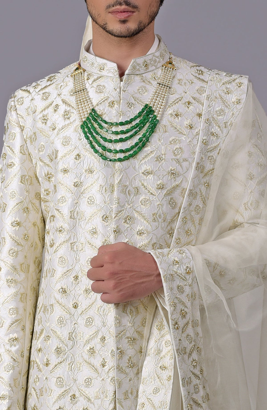 Ivory and gold sherwani with floral embroidery and silk organza dupatta in a five-piece set