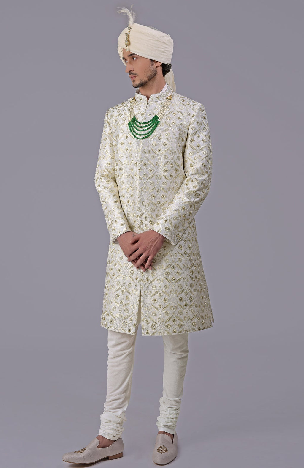 Ivory and gold sherwani with floral embroidery and silk organza dupatta set.