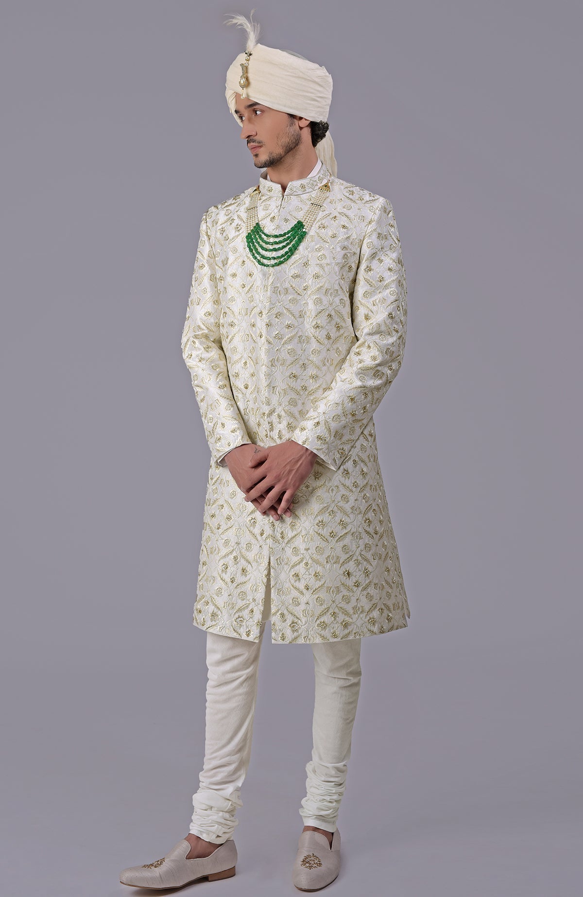 Ivory and gold sherwani with floral embroidery and silk organza dupatta set.