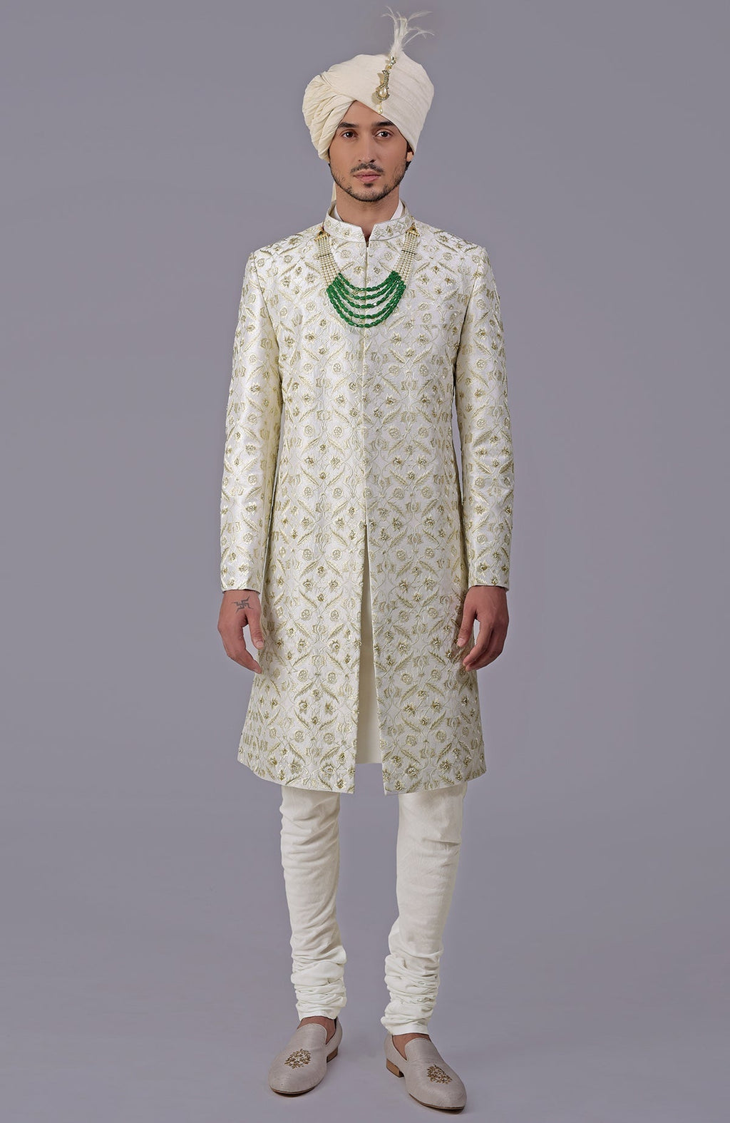 Ivory and gold sherwani with floral embroidery and silk organza dupatta set.