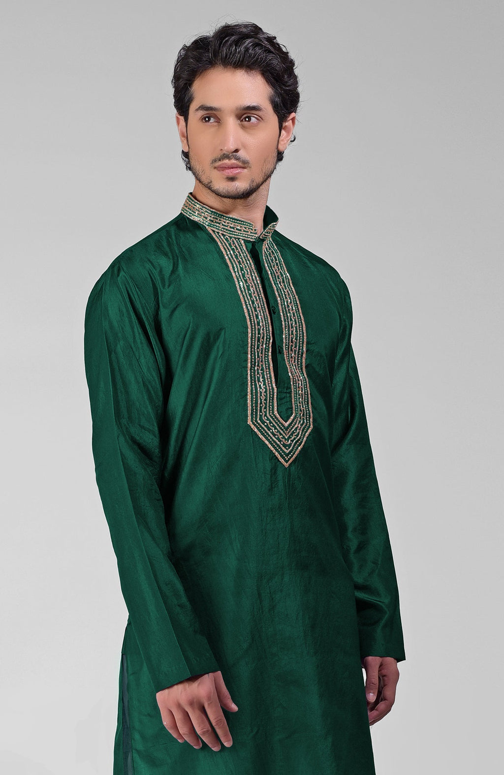 Dark emerald pure silk kurta set with hand embroidered beadwork, sequins, and zardosi details.